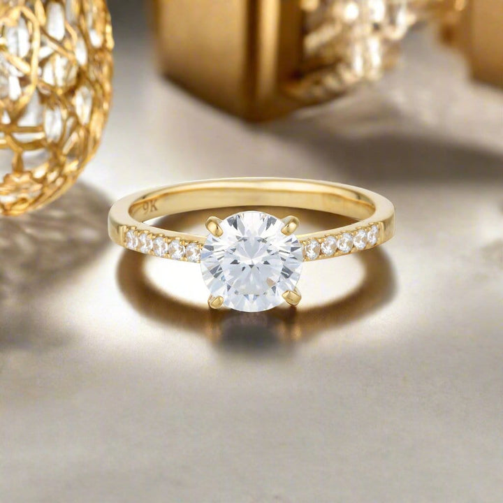 Georgini Ring Georgini Gold Round Brilliant Cut In 1.25ctw Moissanite Engagement Ring In 9ct Yellow Gold Georgini Gold Round Brilliant Cut In 1.25ctw Moissanite Engagement Ring In 9ct Yellow Gold Brand